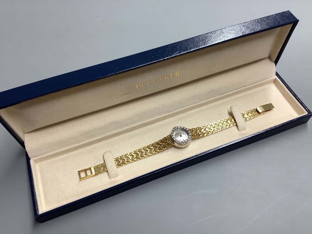 A lady's modern yellow metal (stamped 750) and diamond set Bucherer manual wind cocktail watch, with Bucherer box